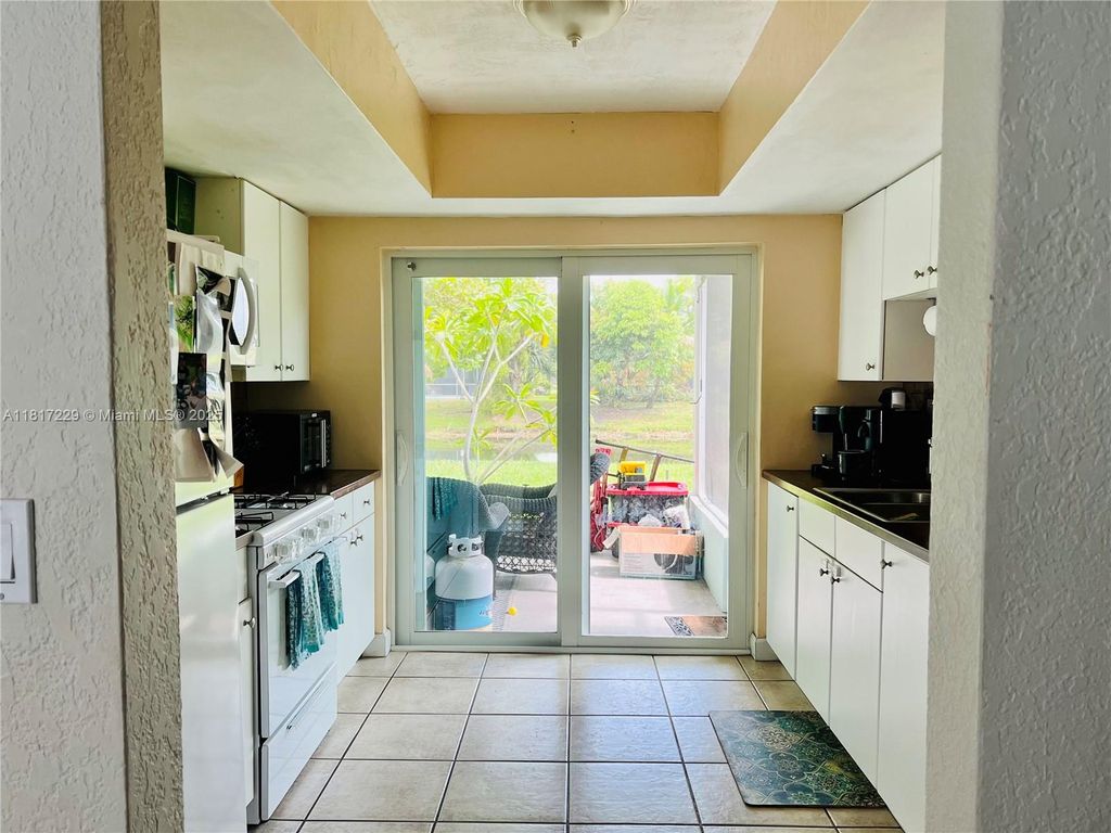 Photo of 8106 NW 21st Ct, Sunrise, FL 33322 (MLS # A11817229)