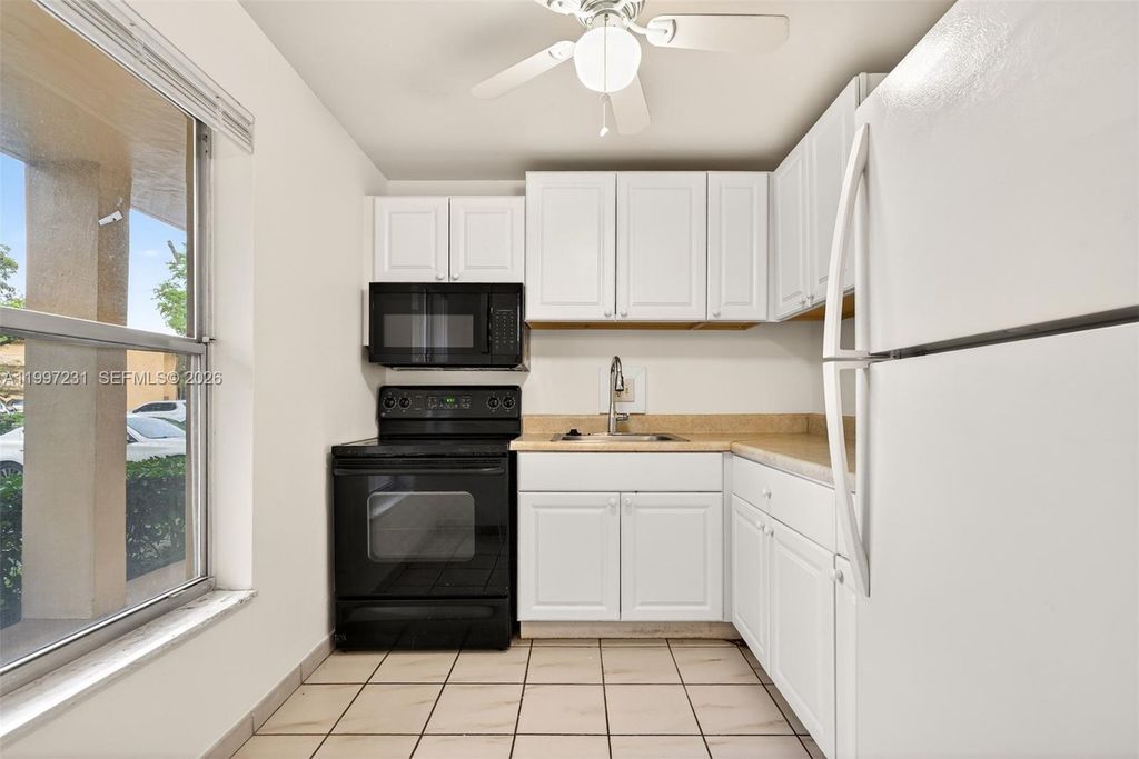 Photo of 5801 NW 62nd Ave #106, Tamarac, FL 33319 (MLS # A11997231)