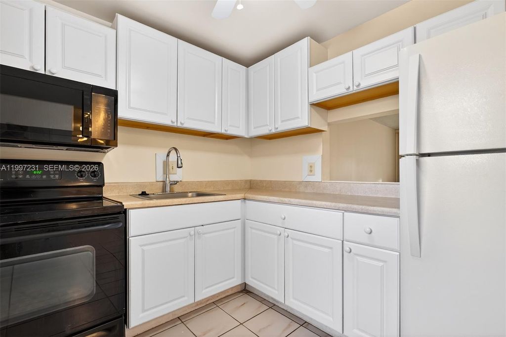 Photo of 5801 NW 62nd Ave #106, Tamarac, FL 33319 (MLS # A11997231)