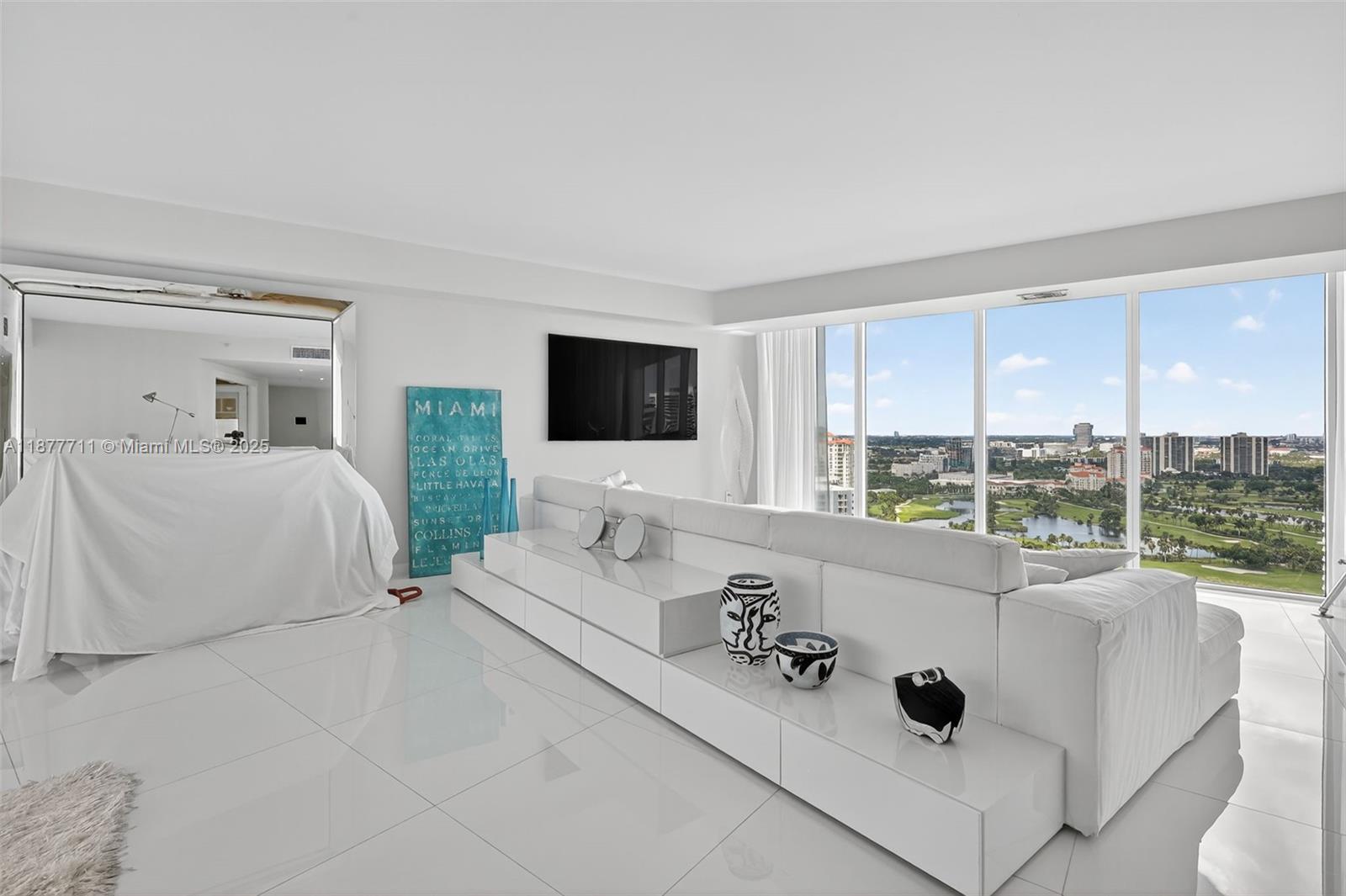 Wow! Enter from semi-private elevator foyer to this 100% renovated white-light-bright masterpiece!
Spacious 2,270SF flow through offers floor to ceiling windows on 2 sides w/amazing intracoastal & ocean views on the East & renowned Turnberry Golf course, lake, and city views on the West. Sunrise & sunset views. 3 bedroom/3 bath +den or 4th bedroom. Gourmet new white kitchen, all new baths. The primary suite features an oversized room size closet! NEW! NEW! NEW! The finest finishes - 2 terraces - utility room & more! Must be seen!
5 Star amenities include: 2 story spa, 2 pools, tennis courts/pickle ball, gym, private 65' marina, private park, valet, 24hr security gate & front desk concierge, covered parking, & much more.