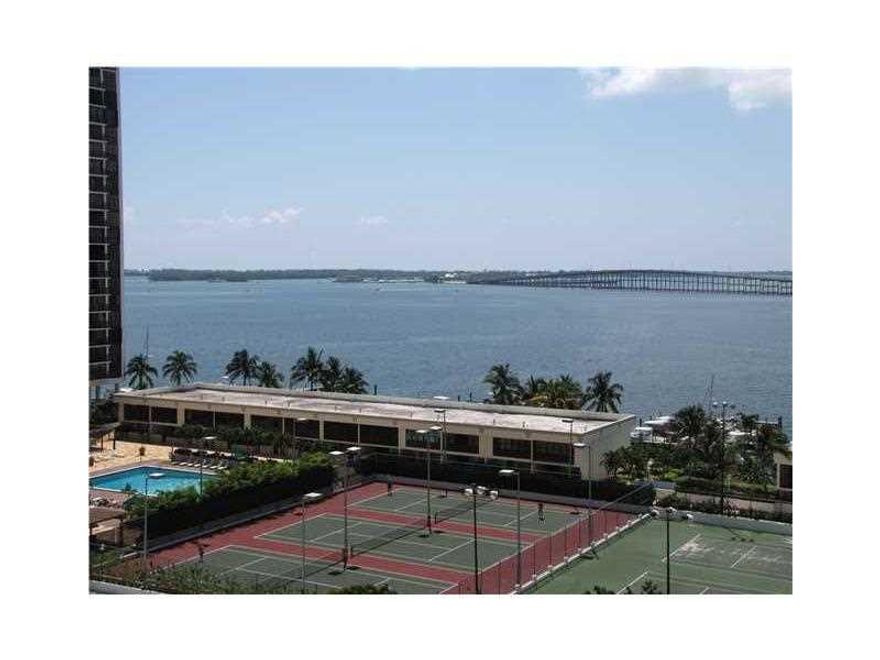 Water views from this 10th floor 1/1.5 plus den , located in the amazing Brickell Place complex.  Unit has a modern new kitchen, marble & wood floors, huge walk-in closet, small storage room & covered garage. In the heart of Brickell, bldg. offers great a menities: 2 pools, 4 tennis courts, gym, BBQ area, laundry service, grocery store & more! Walking distance to Mary Brickell Village, 15 minute drive to airport, 5 minutes to Coconut Grove or Coral Gables. Easy access to I-95 & US1.