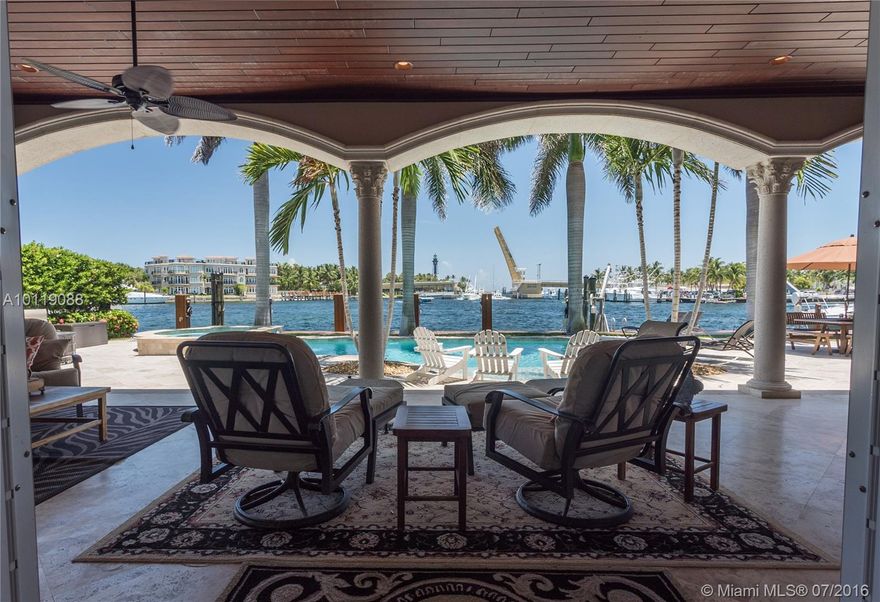 Nestled between sky and sea, Lighthouse Point is a small ocean side town characterized by informal affluence and a leisurely pace. It's laced with 18 miles of waterways, 20 acres of parks and some of South Florida's most beautiful waterfront homes. Discover the Jewel of Lighthouse Point, a custom-built waterfront estate.From the moment you step through the front doors you'll see the impeccable detail, the quality of craftsmanship and most of all the phenomenal water views and location facing the inlet.