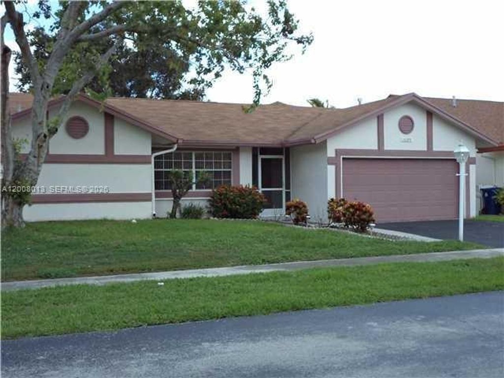 Photo of 10379 Welleby Isles Blvd, Sunrise, FL 33351 (MLS # A12008013)