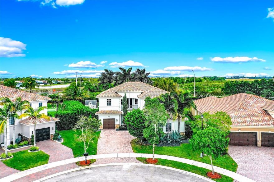 Welcome to this stunning 5bed/4.5bathroom estate located in the highly sought-after Miralago community in Parkland, Florida. Built in 2016, this spacious residence offers approximately 4,100 sq ft of living space on an oversized acre lot, combining modern design with resort-style comfort. Step inside to discover an open and elegant floor plan featuring expansive living areas, high ceilings, and beautifully appointed finishes including brand-new wood floors throughout. The chef-inspired kitchen flows seamlessly into living room, creating the perfect space for entertaining. The home offers five generously sized bedrooms and bathrooms, including a luxurious primary suite designed for comfort and privacy. Outdoors, enjoy your own private retreat with pool, grill, spa and spacious backyard.