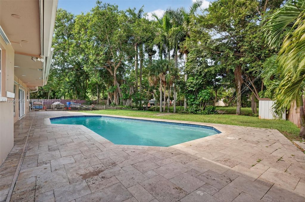 Photo of 801 Holly Ln, Plantation, FL 33317 (MLS # A11895896)