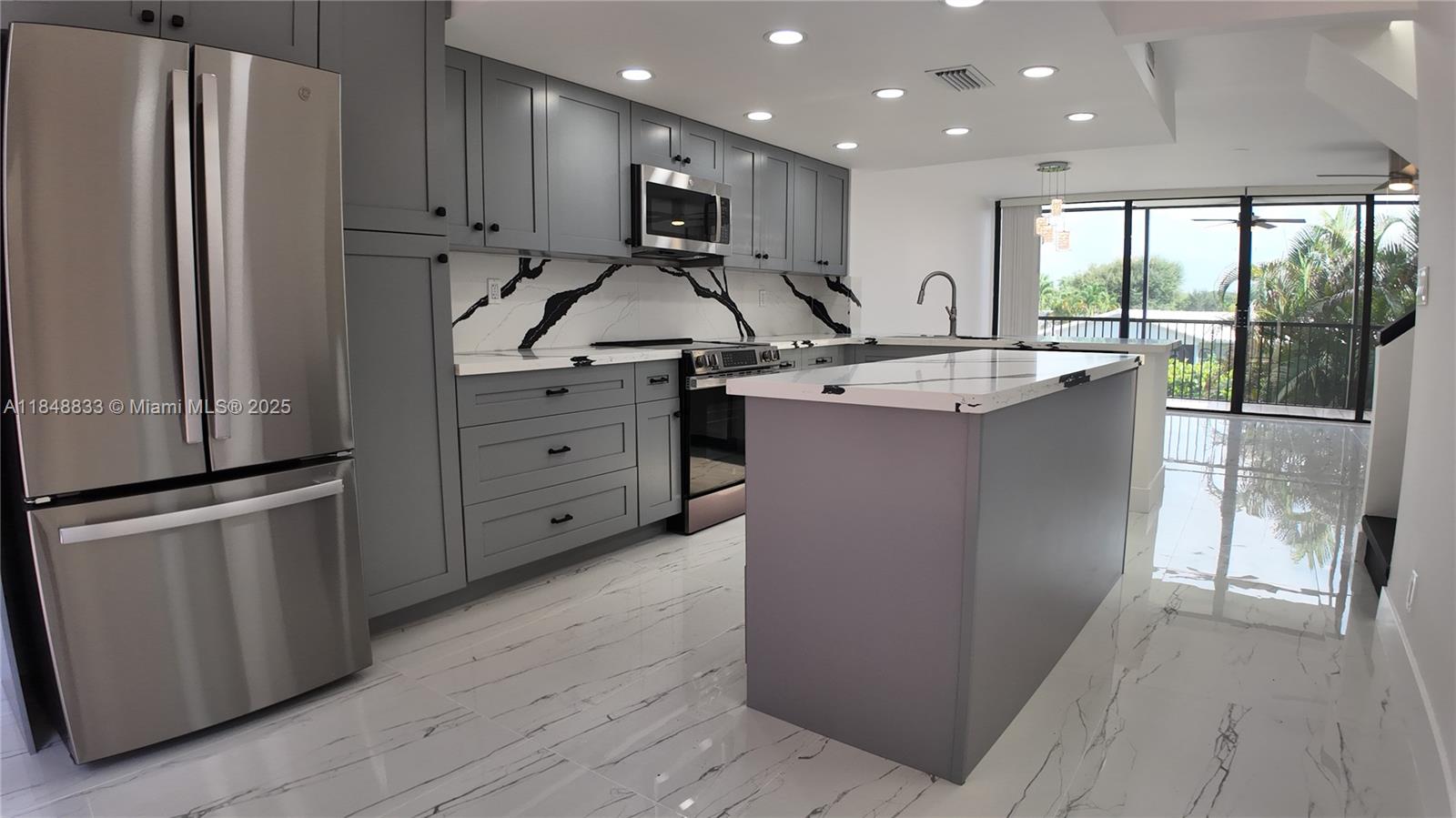Beautiful fully remodeled corner townhome/apt. in bldg with very few units. Enjoy 2 spacious primary bedrooms, 2.5 bathrooms, open living and dining area, and a brand-new open kitchen with modern cabinets, granite countertops, and new appliances. Features two screened mini terraces—one off the living room and one off a bedroom. Both bedrooms include walk-in closets. Separate laundry room with washer/dryer and extra storage. Located in the Harvest condo community with a large pool, jacuzzi, clubhouse, 2 tennis courts, and social areas. Close to top schools, colleges, Nova Southeastern University, FLL Airport, shopping, and more!
