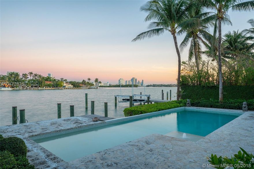 This stunning two-story waterfront home on coveted Venetian Islands is the perfect 10! Completely renovated it features 5,641 sqft of impeccably designed interior spaces including 5 bedrooms, 6.5 bathrooms, 2-car garage under air-conditioning PLUS an attached 1 bedroom/1 bathroom guest/nanny/in-law quarters w/ independent entry. The gourmet kitchen sports top of the line appliances while the second-floor master suite features generous walk-in closet, his and hers bathroom, and secluded private balcony overlooking the tranquil waters. The private dock, 60 feet of sparkling waterfrontage, covered outdoor terrace, heated pool, tons of natural light, and proximity to Miami International Airport, Downtown, and Lincoln Road all make this an exquisite oasis!