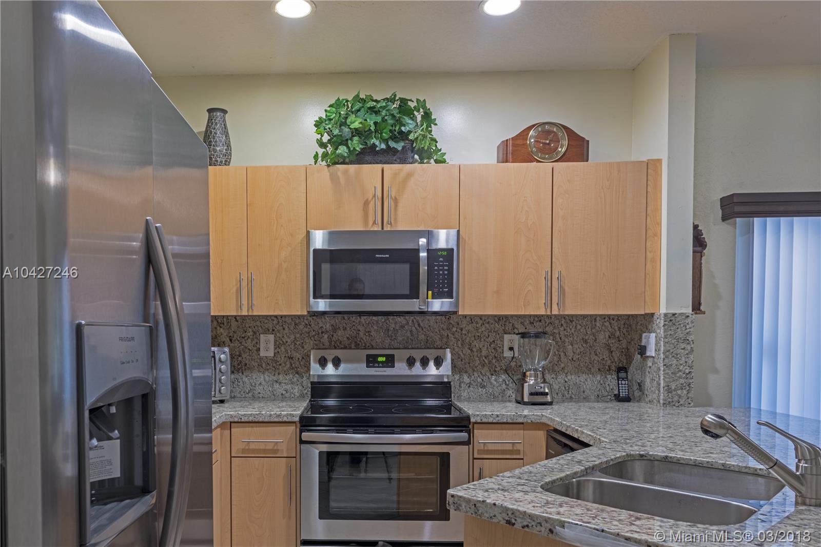 Beautiful 2 story - 3 beds - 2.5 bath, Eat-in kitchen with NEW STAINLESS STEEL APPLIANCES & GRANITE COUNTERTOP, Separate Living & Dining, Storage, Ceramic floor downstairs & Wood-looking laminate floor upstairs, Lovely screened porch. No neighbors behind you gives you an added sense of privacy. Gated community with call box & automatic gates for residents. 24 hr security. Club house amenities include: Pool, Tennis court, Playground and Gym. The community is surrounded by 4 A+ Schools, 3 Parks, 6 major Shopping Centers and 2 Malls. Close to Fla Turnpike. Don't wait and call for showing today!