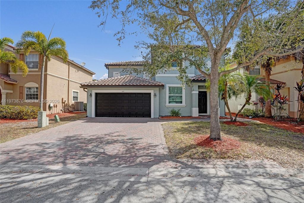 Photo of 847 NW 127th Ave, Coral Springs, FL 33071 (MLS # A11973876)