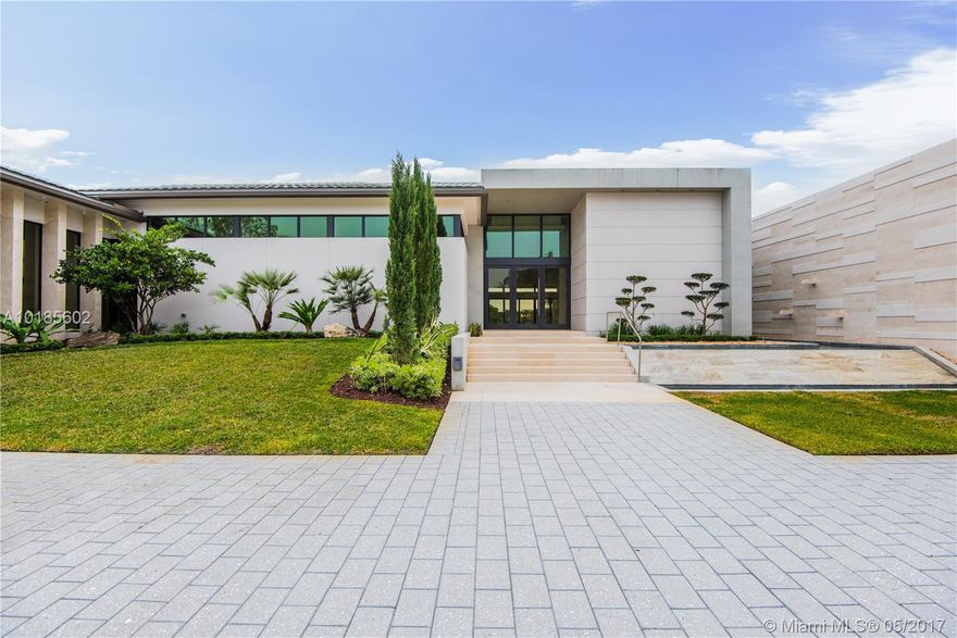 Newly built contemporary estate home located in the most prestigious community in the City of Weston "Windmill Ranch Estates". This 11,334 square foot, 7 Bedroom, 8.5 Bathroom, 4 Car Garage estate was designed and built with the most exquisite taste and materials available from different parts of the world. Material used were carefully hand selected to highlight its natural beauty and detail.