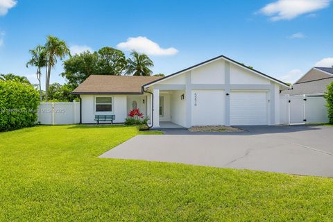 Photo of 5276 Pine Tree Dr, Delray Beach, FL 33484 (MLS # A11892842)