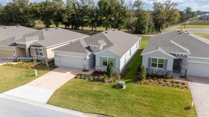Furnished or Unfurnished 4-Bedroom Rental in Ocala Preserve – Just 5 Miles from WEC!
Features include a double garage, open kitchen, SS appliances, walk in closets, full size washer and dryer, no rear neighbors for added privacy, and a peaceful terrace. Perfect for seasonal stays or equestrian enthusiasts. For rent for 3 months and up.Enjoy resort-style amenities: a 7-acre lake, miles of trails, themed parks, and a Tom Lehman-designed golf course. The Clubhouse offers dining, fitness, and social events.Located minutes from the World Equestrian Center and downtown Ocala. Club membership available with 3+ month lease! Utilities are included for your convenience. Since this is a brand-new home, you may not find it on maps yet—please search for the Ocala Preserve Community to locate the area.