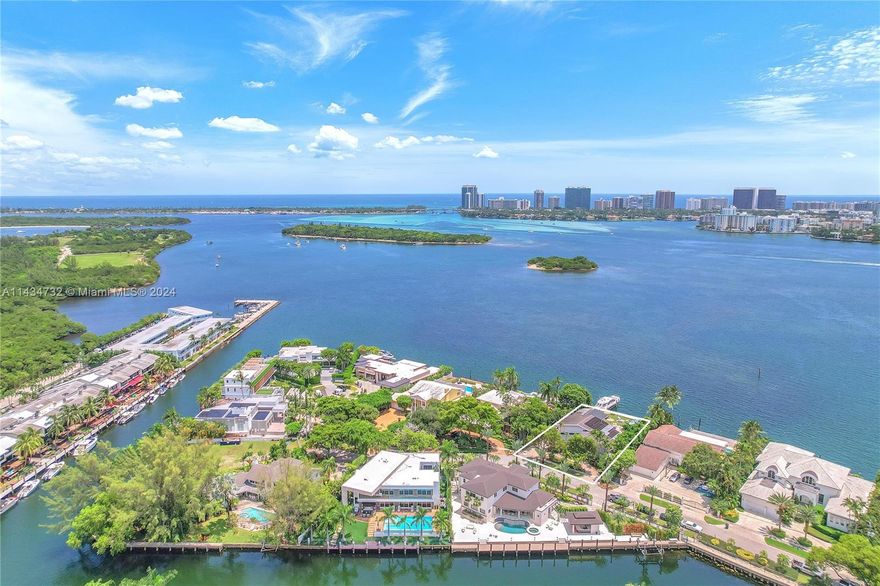 Welcome to Keystone Islands, waterfront gated community with panoramic crystal clear water views indirectly front of Sunbar, Bal Harbor & Three Islands. Enjoy outdoor living on the best island in Keystone Point 05, w/summer kitchen,pool, and 102 feet of water views of open Bay/Bal Harbour Bay, Downtown Miami Bay, & Sunny Isles skyline. New Truline seawall, private dock with 16/18 Feet depth, room for 100 ft yacht, only FIVE minutes out to sea. This exquisite home sits at the end of the street, traffic free & boosts over 5,040 sq ft of living space. Gigantic open floor plan with unique touches. Soaring volume ceilings w/splendid wood beams. Gourmet chefs kitchen opens to vast family room. Separate owners suite upstairs, large walk in closets, w/sitting room and terrace overlooking the bay.