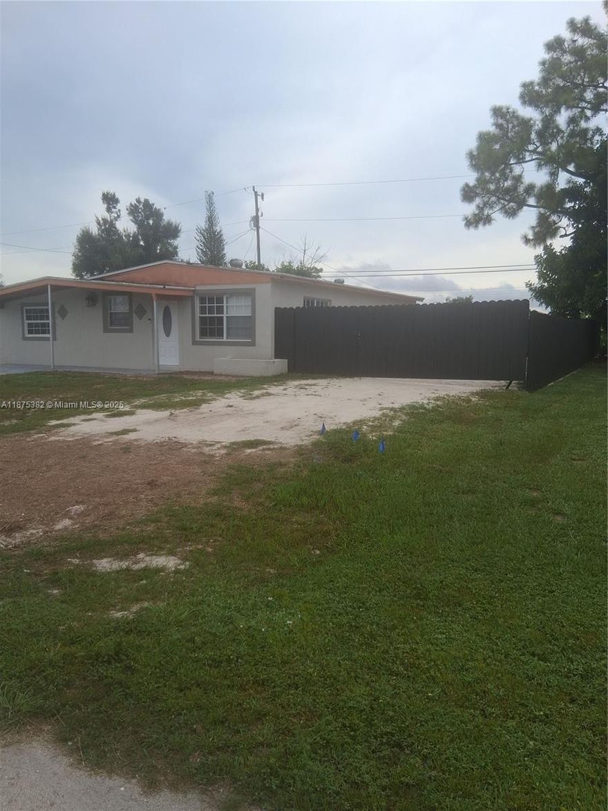 2-bedroom 1-bathroom House. attached 1-bathroom 1bedroom, Roof only 10 years, remodeled kitchen, all new A/C ducks installed, city water, no flood insurance, Perfect location with large, fenced yard in the center of Lehigh acres Florida. near restaurants, Hospitals, Market and more. Fifteen minutes of Fort Myers and the I-75. The Seller helps with closing costs.