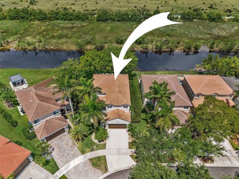 Photo of 1581 Winterberry Ln, Weston, FL 33327 (MLS # A12035664)
