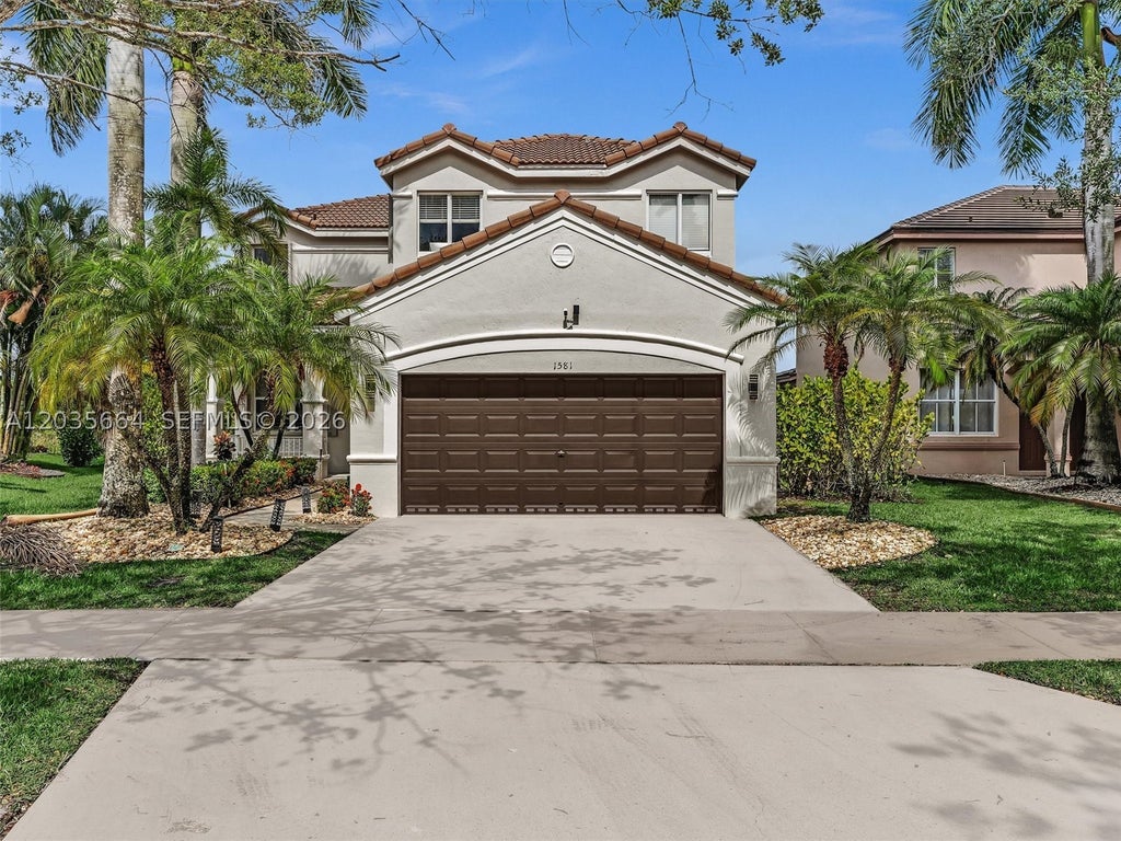Photo of 1581 Winterberry Ln, Weston, FL 33327 (MLS # A12035664)