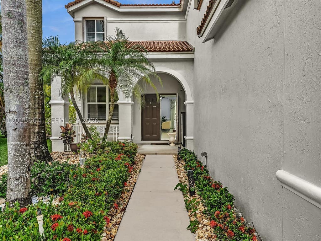 Photo of 1581 Winterberry Ln, Weston, FL 33327 (MLS # A12035664)