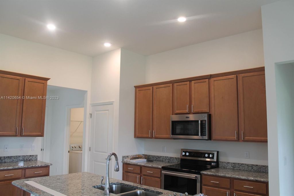 Photo of 5838 NW Coosa Dr, Port Saint Lucie, FL 34986 (MLS # A11420654)