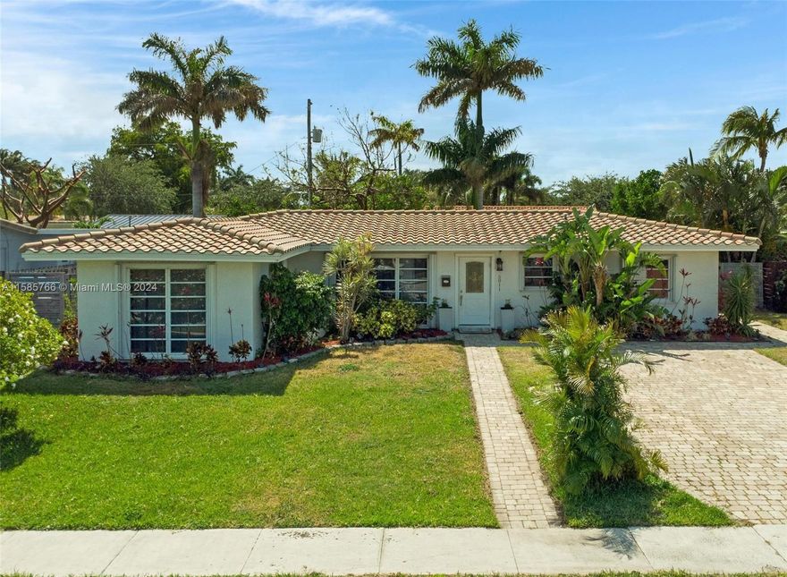 *** MOTIVATED SELLER *** This Fabulous 3/2 home boasts a spacious open floor plan w/ beautifully UPDATED KITCHEN, dining room & enormous living area—perfect for entertaining! Huge primary bdrm has lots of closets. Private backyard Sanctuary is complete w/stunning SALTWATER POOL & SOOTHING WATERFALL, surrounded by Lush Landscaping that creates a tranquil atmosphere. Additional features include: Large Indoor Laundry Room, Generator, Outdoor Shower & Huge side yard for your boat or toys. A/C replaced in 2021, Roof done in 2018. Lighthouse Point is a wonderful WATERFRONT COMMUNITY known for its amenities, including boating, fishing & diving. And with it's FANTASTIC BEACHES, you'll never be far from RELAXATION & FUN. Don't miss out on this incredible opportunity! *** PRICED TO SELL! ***