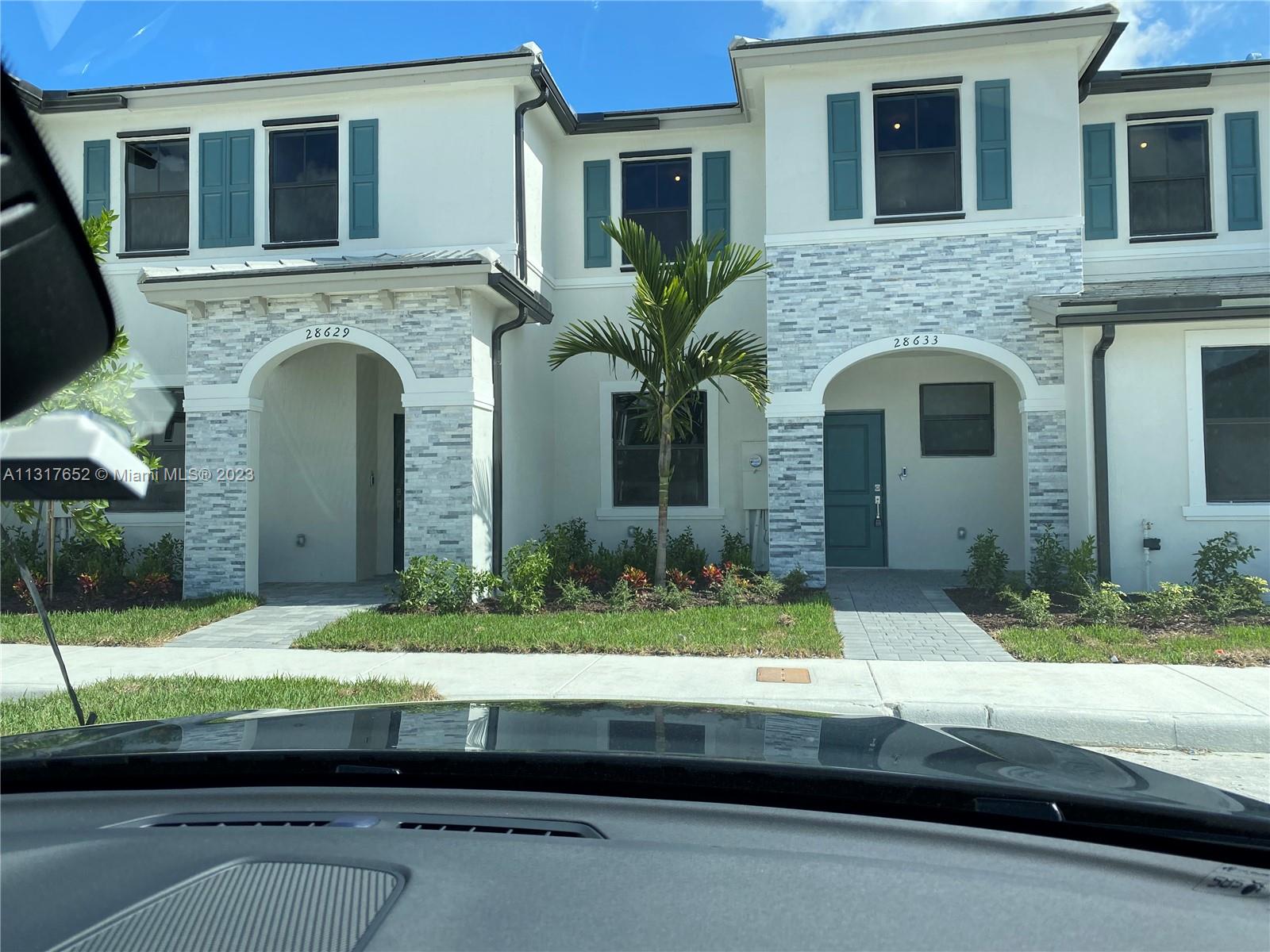 Photo 2 of 21 of 28713 SW 132nd Pl 28713 townhome