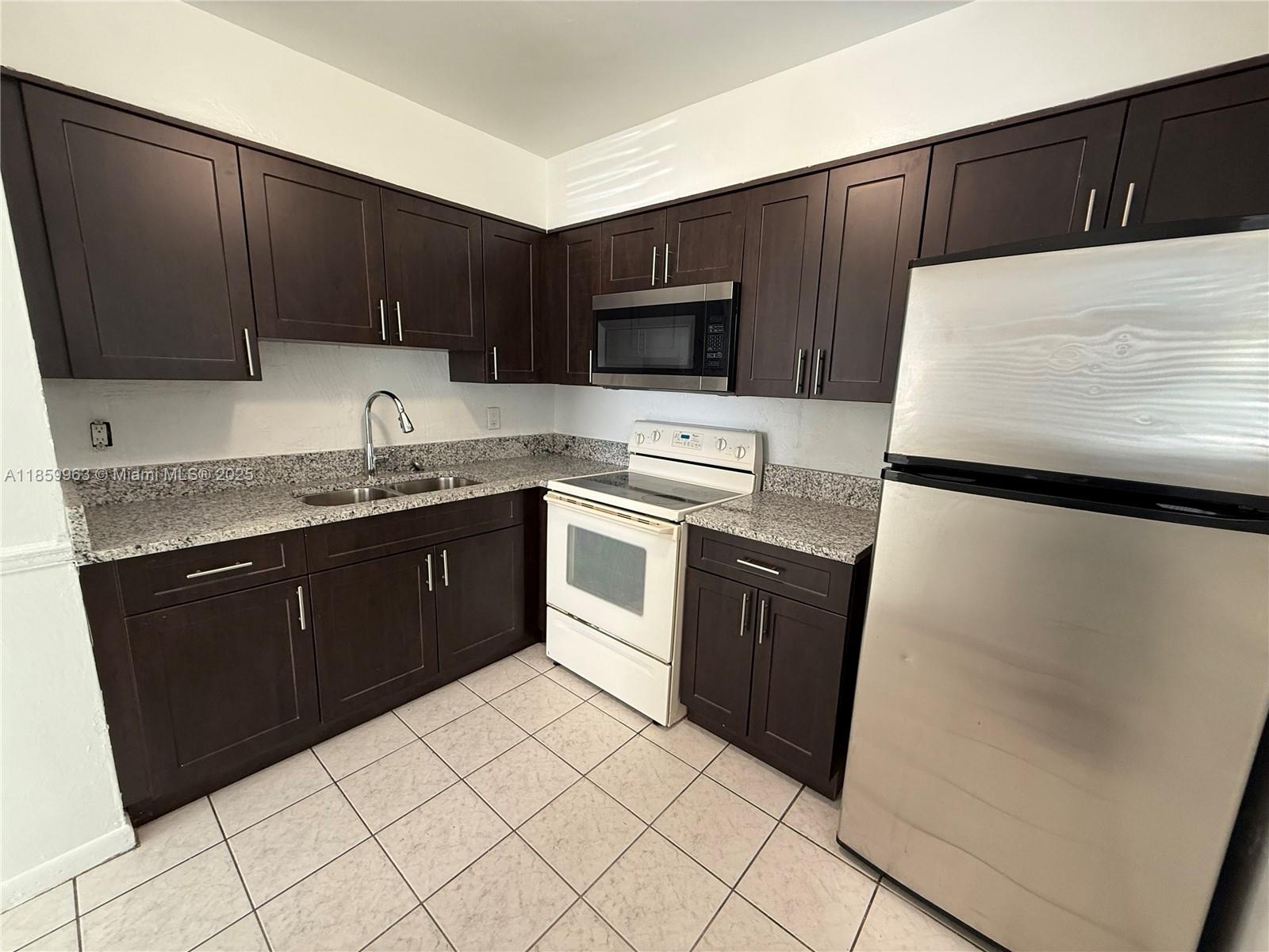 Beautifully updated and move-in ready! This spacious 2 bedroom, 1 bath unit has been freshly painted and features a brand new kitchen. Enjoy the bright, open living space with plenty of natural light. Convenient location with rapid approval. A great opportunity for qualified renters!