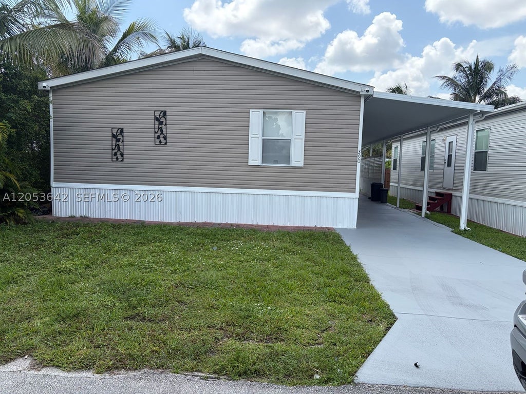 Photo of 390 NW 134th Ave, Plantation, FL 33325 (MLS # A12053642)