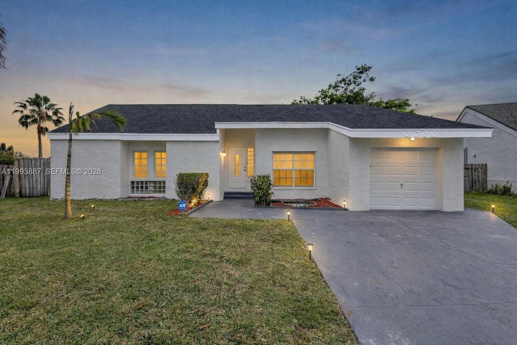 Photo of 2710 Azalea Ave, Miramar, FL 33025 (MLS # A11995887)