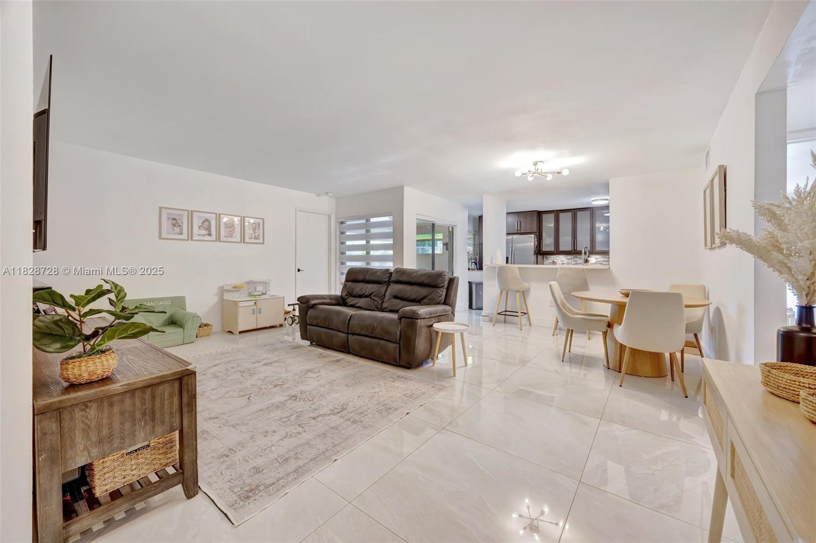 Impeccably maintained first floor 2/2 unit has been tastefully renovated with new floors and stainless steel appliances. The unit boasts an open concept with two spacious bedrooms and open walk-in closets. The unit features a large patio with easy access to the pool, tennis court and lake.