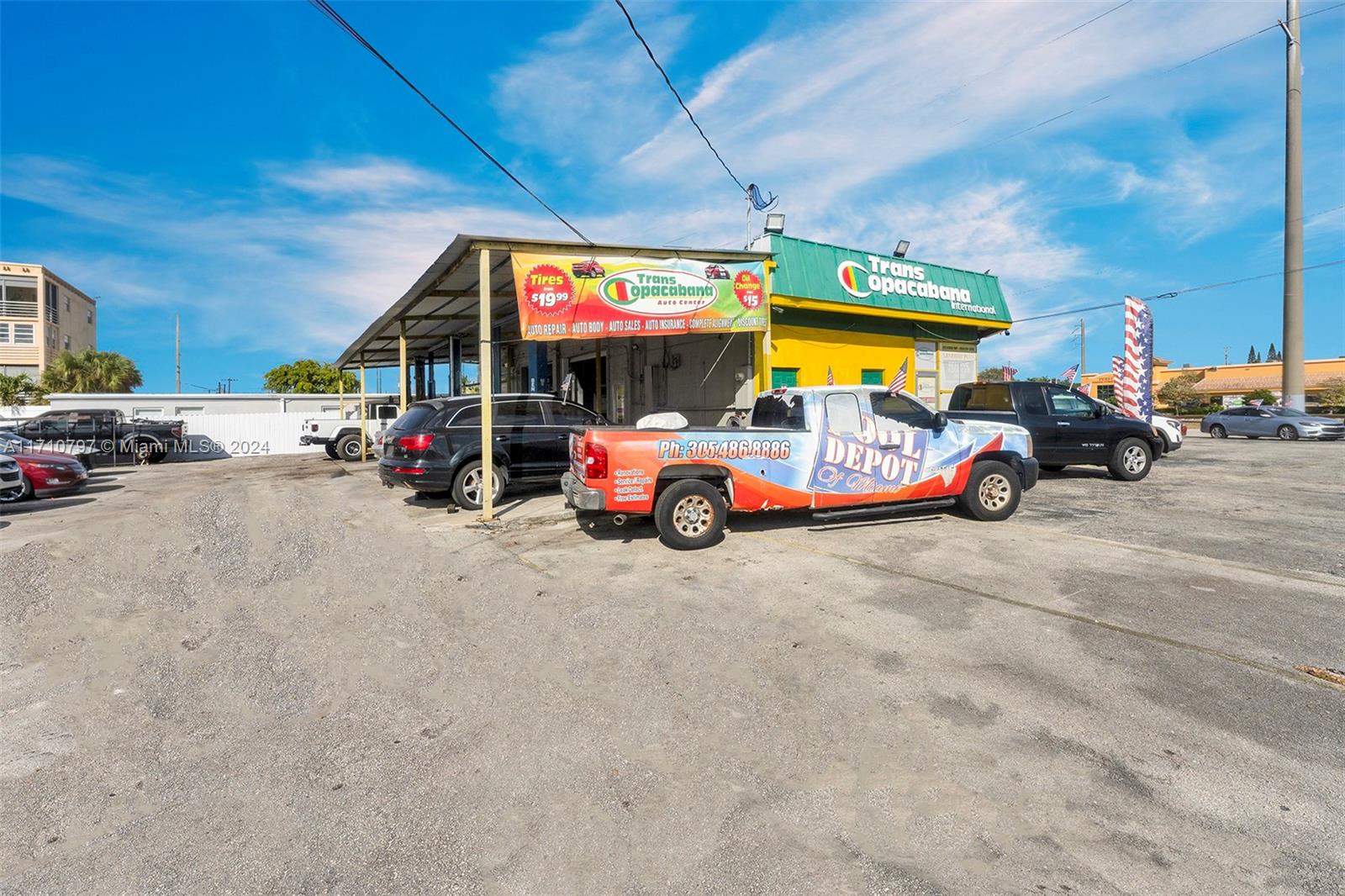 This highly visible on the corner of N. Dixie Hwy and Pierce St. Currently operating as a automotive dealership and repair shop. Business is operating in a freestanding building totaling approx. 1,282 SF, featuring: 3 roll-up door bays; 5 car lifts under a covered overhang; and a brand-new paint booth equipped with fire suppression and exhaust fans. The expansive lot offers ample parking to accommodate a large vehicle inventory. Most importantly, the grandfathered-in use for auto dealership and repair, a rare and highly valuable in this area.