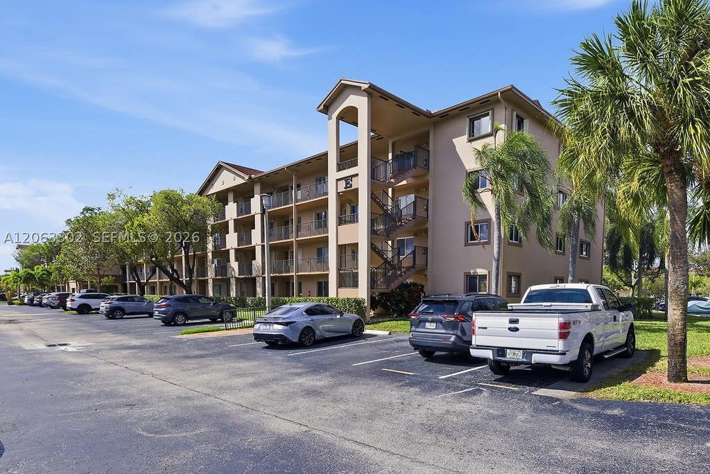 Photo of 1200 SW 137th Ave #308E, Pembroke Pines, FL 33027 (MLS # A12063302)