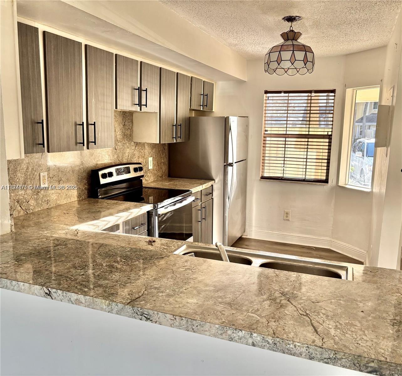 Beautiful Updated townhouse with lake view, 2Bedrooms, 2 1/2 baths, new kitchen cabinets & countertops, NEW stainless steel range, refrigerator & dish washer, walls painted, bathroom vanity has been update, MINUTES FROM THE TURNPIKE AND SAWGRASS, CLOSE TO SHOPPING, BUS ROUTE & SCHOOLS. WASHER/DRYER IN THE UNIT, WALK-IN CLOSET IN MASTER BEDROOM. VERY ATTRACTIVE COMMUNITY WITH POOL AND AMENITIES , 2 external storages, VERY LOW HOA $300. NEGOTIABLE. Please text me for questions, comp and showing. Tenant in place until Feb 2026. Sell as is. Price is some negotiable.
