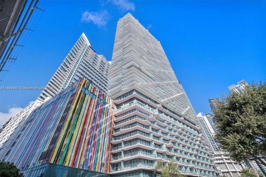 Welcome to Dua Miami, formerly the SLS Residences, featuring one of the most desirable corner lines in the bdlg. This stunning 2BR, 2BA +den residence is flooded w/ natural light through floor-to-ceiling windows wrapping around the entire unit. The expansive wraparound balcony offers beautiful city and pool views, plus an extra bump-out area for added outdoor space, perfect for lounging or entertaining.
Inside, the den provides a versatile space ideal for a home office or cozy sitting area. Residents enjoy hotel-style amenities, including a bar ,restaurant at the main pool, a private rooftop pool with breathtaking panoramic views of Miami.All of this in the heart of Brickell, steps from Brickell City Centre, the MetroRail, Mover stations, placing the best of Miami right at your doorstep.