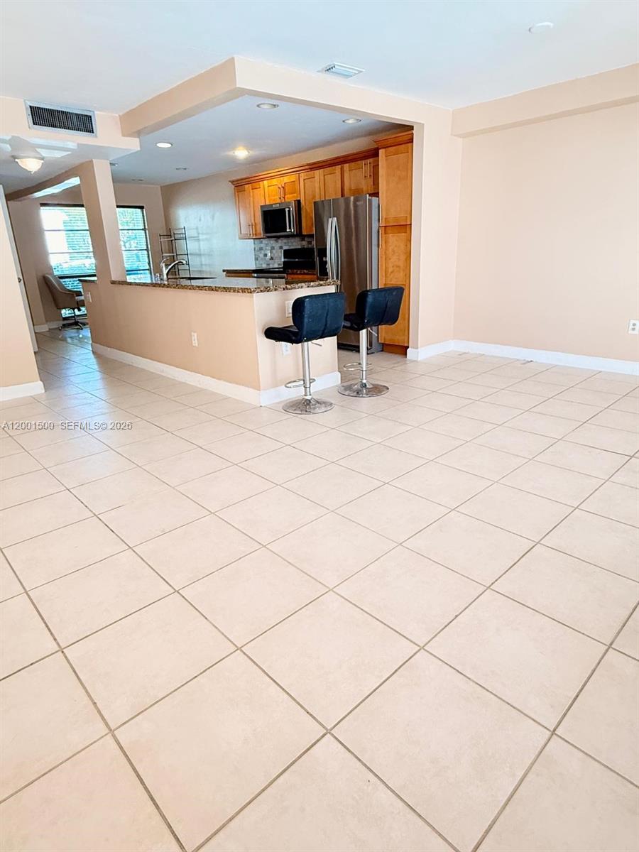 HOLLYWOOD GARDENS CONDOMI - Residential Lease