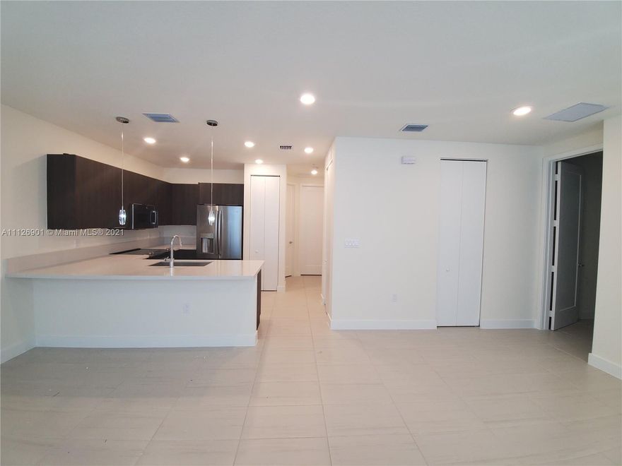 Beautiful and Contemporary State of the Art Kitchen with stainless steel appliances and white quartz counter. Washer and Dryer inside unit. Tiled throughout. modern blinds in windows. LANDMARK Community Clubhouse with full amenities. ( Gym, Pool, BBQ Areas and Tennis Courts). Come and look for yourself what an excellent unit with great location and park view. PERFECT FOR INVESTORS.