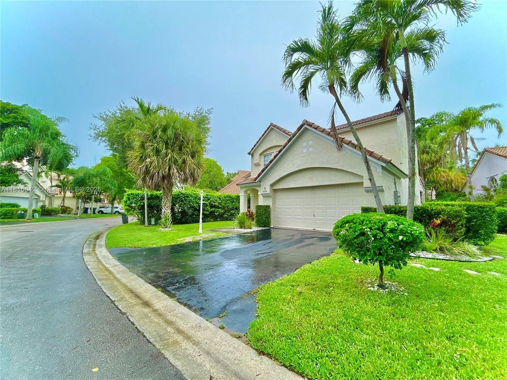 Photo of 3836 Jasmine Ln, Coral Springs, FL 33065 (MLS # A11816042)