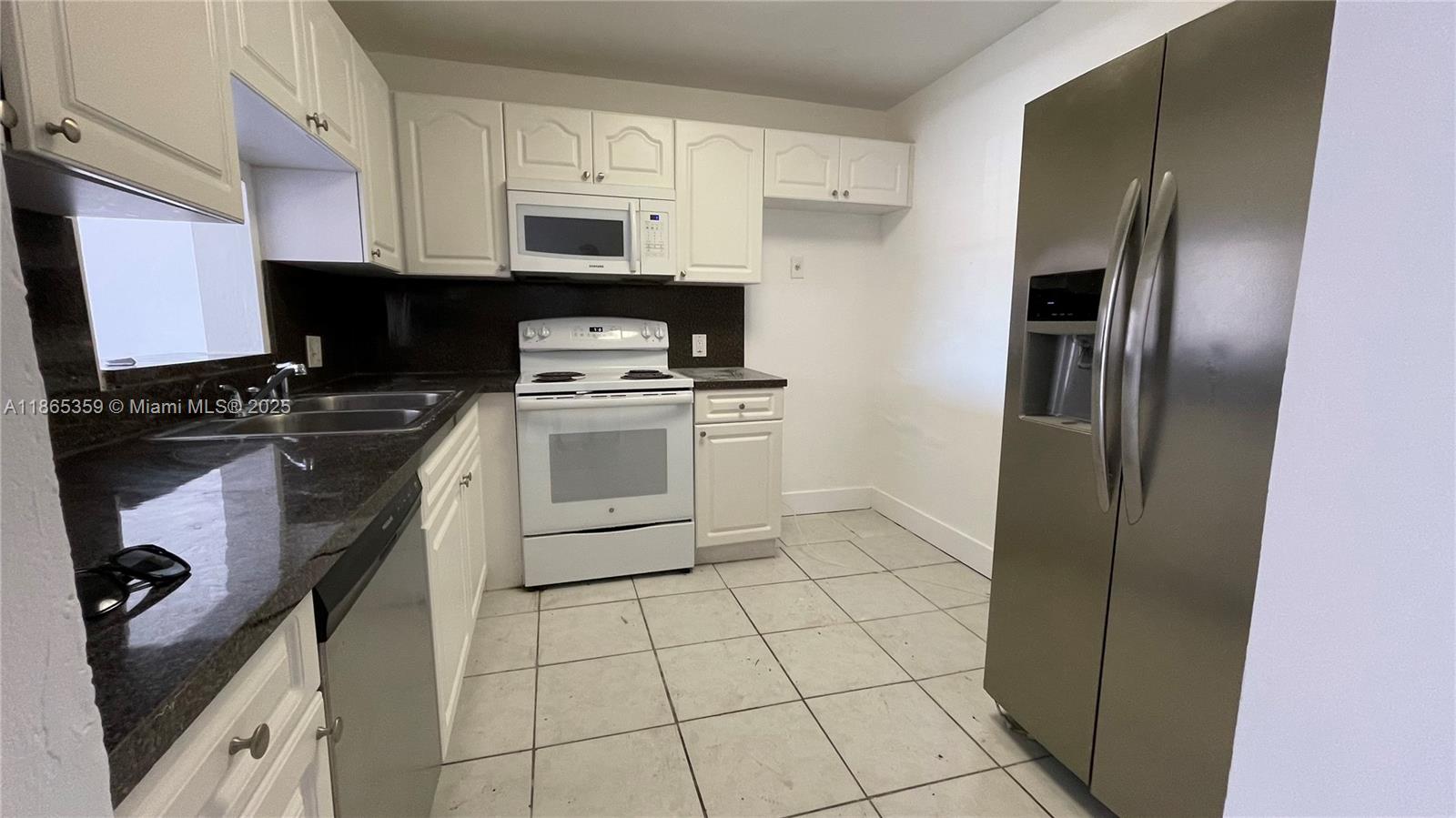 1046sqf 2/2 Corner unit recently updated, vinyl floors. Lots of natural light. Walk in closets, dishwasher, bathtub and shower. Assigned parking, gated community. 7 days approval with 700+credit and 2.5x+ income/rent. Minutes from I-95, Barry university, Shoppings, Restaurants. Security patrol and management in site. Pool, gym, tennis courts and clubhouse.