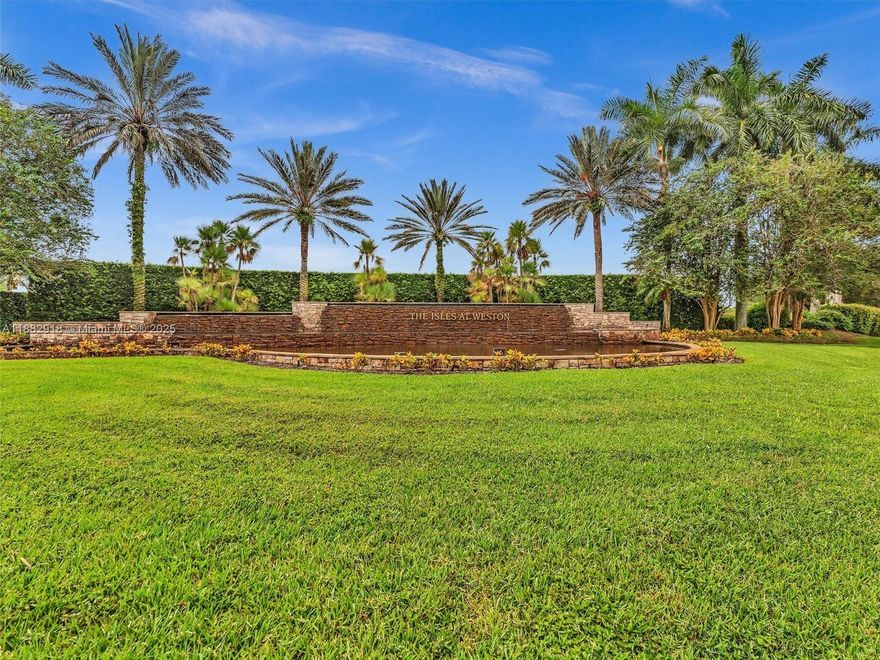 Lake front property in the great community of Isles at Weston. One floor. Very well maintain home. 4 bedrooms / 3 bathrooms / 2 car garage. Travertine marble in social areas and main bedroom. Mahogany wood flooring in the other bedrooms. Granite counters in kitchen. Custom vanities in bathrooms. Paver driveway and patio. Screened patio. Spacious family room& living room areas.  The community offers plenty of amenities: pool, exercise room, clubhouse, basketball, volleyball. A graded schools.