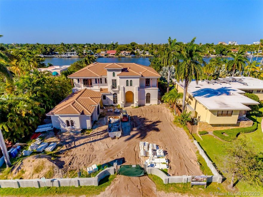 Gorgeous Brand New (to be completed within 3-4 months) Mediterranean home with contemporary design with total 6 Bedrooms plus maid's room+office+loft/gym and 7.5 bathrooms. Under Roof Total SQ Footage will be around 9,116 Total SQ FT for the house is around 9530 SF First floor will have 2 bedrooms with 2 full bathrooms, office, maid's bedroom with full bathroom, club room, living room, kitchen, dining room and a family room. Second floor - Master bedroom with large bathroom/ his and hers toilet rooms, exercise room, second large master with full bathroom, plus additional 2 bedrooms 2 bathrooms. Large beautiful lot with amazing open water view, 100 feet on the water. Pool, spa, gazebo, the property will be gated.