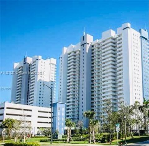 Condominium in North Miami FL 14951 Royal Oaks Ln.jpg