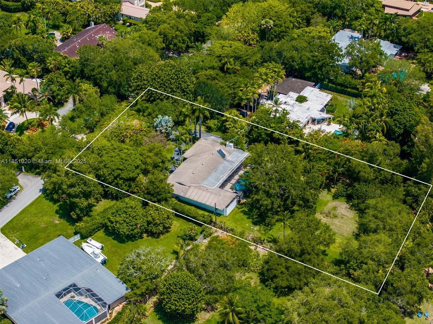 Exceptional Opportunity in Prime Pinecrest! This 41,560.50 SF lot (as per owner survey) offers incredible potential for new construction or a complete renovation. Its rectangular shape provides the perfect canvas for developers aiming to build a dream home or an exclusive residential estate. It's located in a quit street surrounded by trees. On this prime lot, you will find a spacious 2,747 SF home, featuring 4 large bedrooms, 2.5 bathrooms, 2-car garage. The back of the house opens to a screened-in pool & a beautiful entertainment area overlooking a deep, fenced lot surrounded by oak and palm trees. Situated within Pinecrest Elementary School district, minutes from Aleyda Mas Park, this home qualifies for maximum insurance mitigation credits and is located in an X flood zone. A must see!