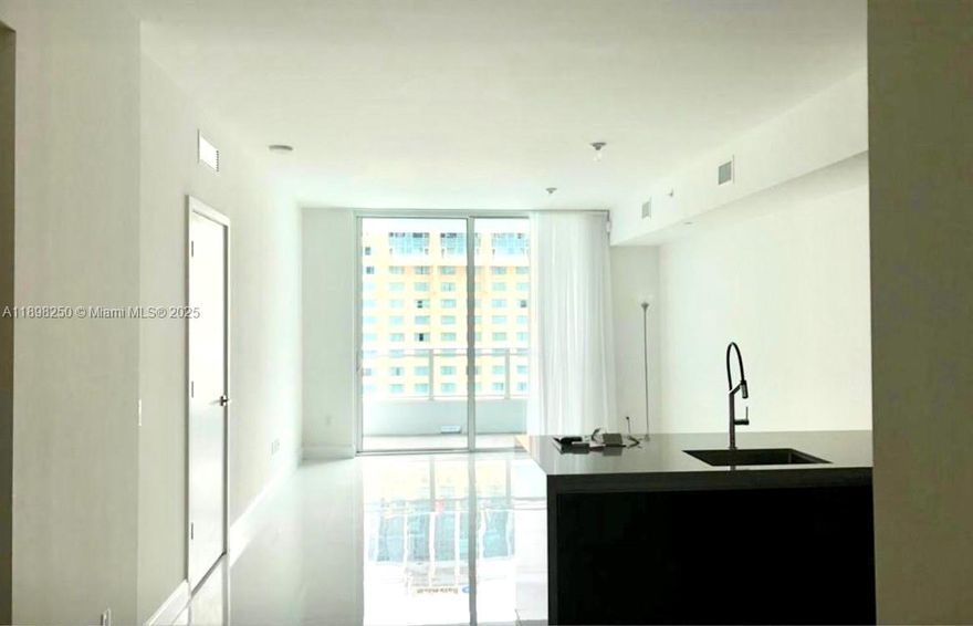 Beautiful 1 bd +Den 1.5 bath condo featuring unique spacious open layout design, 906 SQFT with luxurious finishes located at Glamorous, British-Inspired The Bond on Brickell. Floor-to-ceiling windows offer maximum natural light and views, complete with large balcony facing east and amenities deck. Extraordinary opportunity for those seeking a sophisticated and comfortable urban lifestyle, located in one of the trendiest neighborhoods in the US. 1 Assigned Parking Space. Top-of-the-line built-in Bosch Kitchen appliances, Washer and Dryer inside the condo. Walk-in closet. Located in the heart of Brickell, steps to dining, shopping, and entertainment options. Basic cable and internet included.
