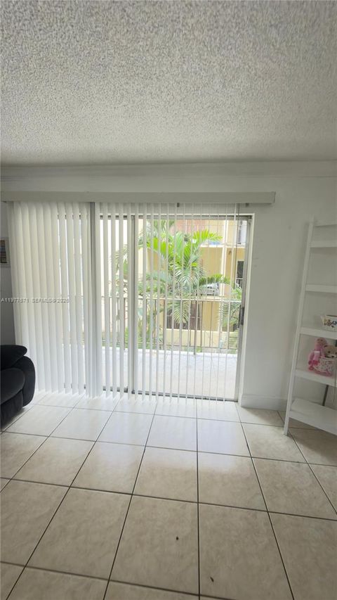 Photo of 11925 NE 2nd Ave #B207, North Miami, FL 33161 (MLS # A11977671)
