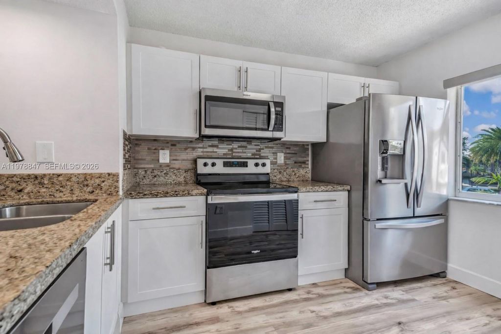 Photo of 126 Riviera Cir #126, Weston, FL 33326 (MLS # A11978847)