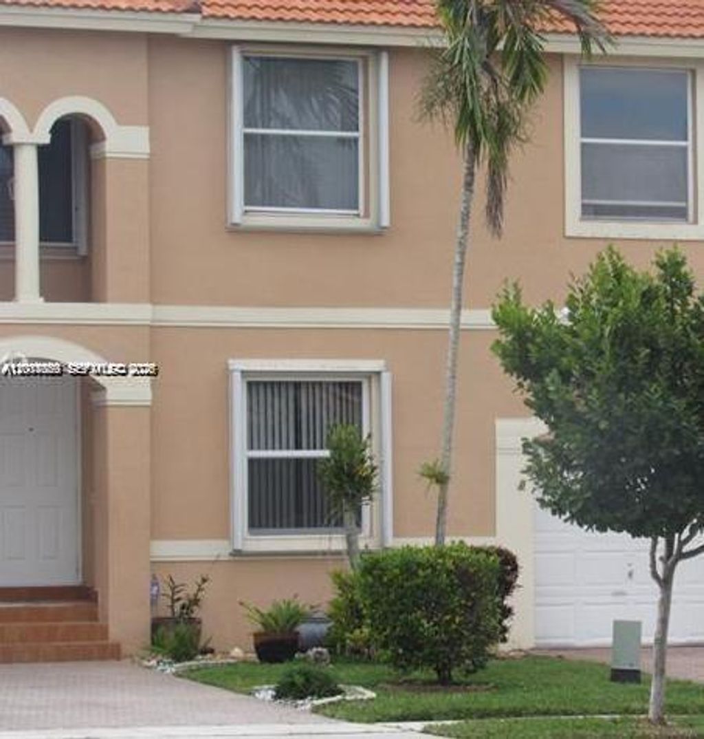 Photo of 2218 NW 160th Ter #2218, Pembroke Pines, FL 33028 (MLS # A12017089)