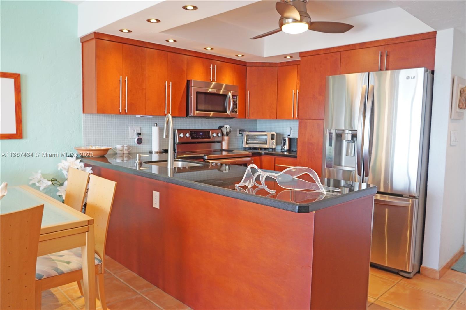 Wonderful Unit W/ Assigned Parking & BREATHTAKING View Of Miami & South Beach At Night! This Unit Has It All. Updated Kitchen & Bath, Stainless Steel Appliances, Granite Countertops, Washer/Dryer, Tankless Hot Water Heater, & New Best-In-Class Impact Resistant Windows & Sliding Door Just To Name A Few! Enjoy A Drink On Your Double-Long Balcony w/Several Of Your Closest Friends While Watching The Cruise Ships Sail Away & The Incredible Lights Over The City & Biscayne Bay. Building Features A Heated Pool, On-Site Manager & Concierge/Doorperson, Parking, & Additional Storage. HOA Includes The Usuals + Cable, Internet, & Indoor Pest Control & A Low HOA Fee. The Beach Is Literally Your Backyard As is Beach Yoga & Volleyball. Carbone, Joe's Stone Crab, Prime 112 & More Just Steps Away!