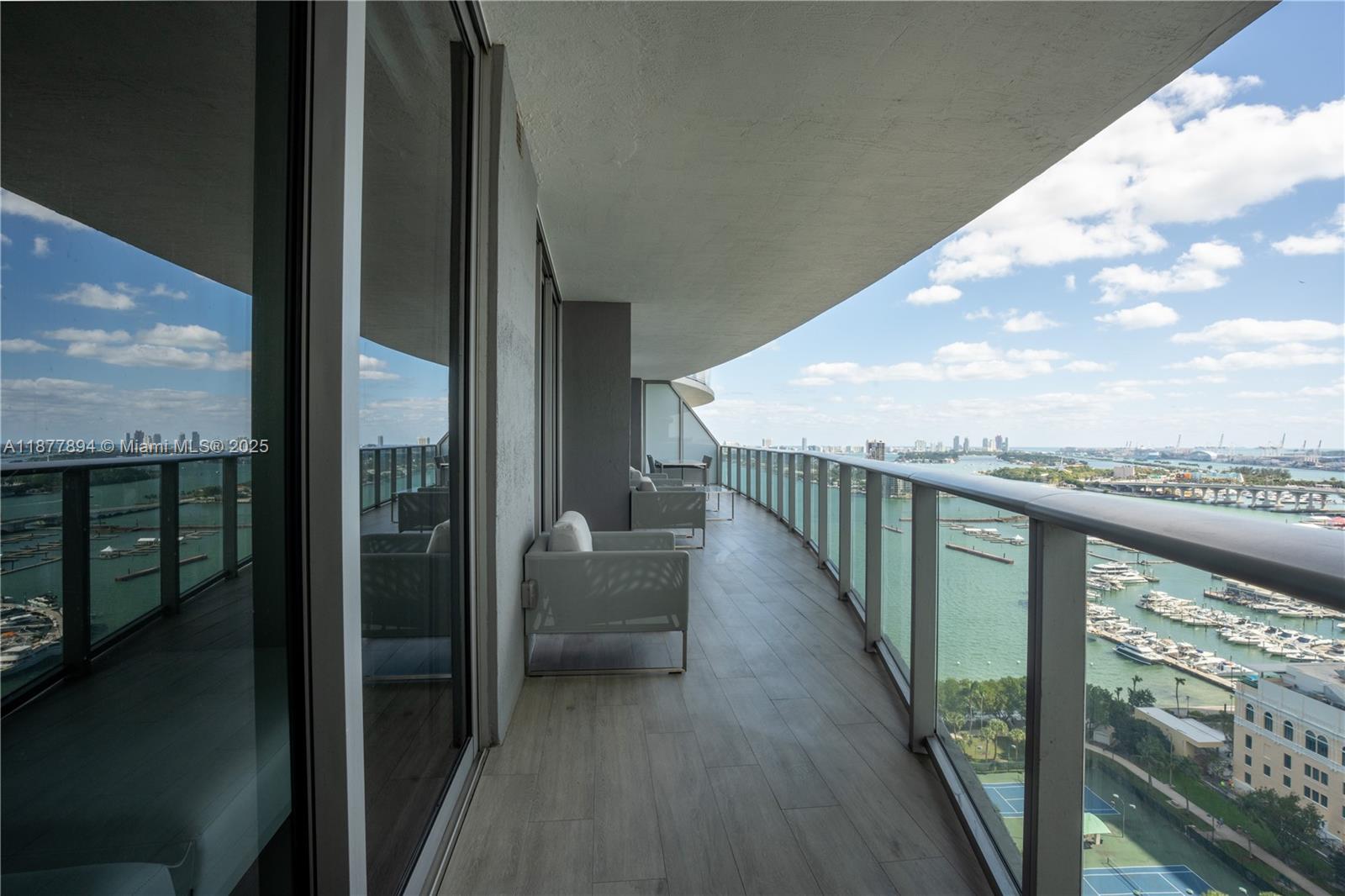 Welcome to Aria on the Bay, a masterpiece of modern design by Arquitectonica, nestled in the heart of Edgewater. This 22nd-floor unit, the most competitively priced in the coveted 10-line, offers breathtaking south-facing views of Biscayne Bay and the dazzling city skyline. Step inside and discover sleek porcelain floors, a gourmet kitchen with Italian cabinetry, and floor-to-ceiling windows that flood the space with natural light. Enjoy a resort-style lifestyle with unparalleled amenities, including sunrise & sunset pools, a luxurious spa, a private theater, and 24-hour concierge service. Perfectly located just steps from Margaret Pace Park, the Adrienne Arsht Center, and Miami’s vibrant arts and dining scene. Come and be one of the exclusive residents of this exceptional building.