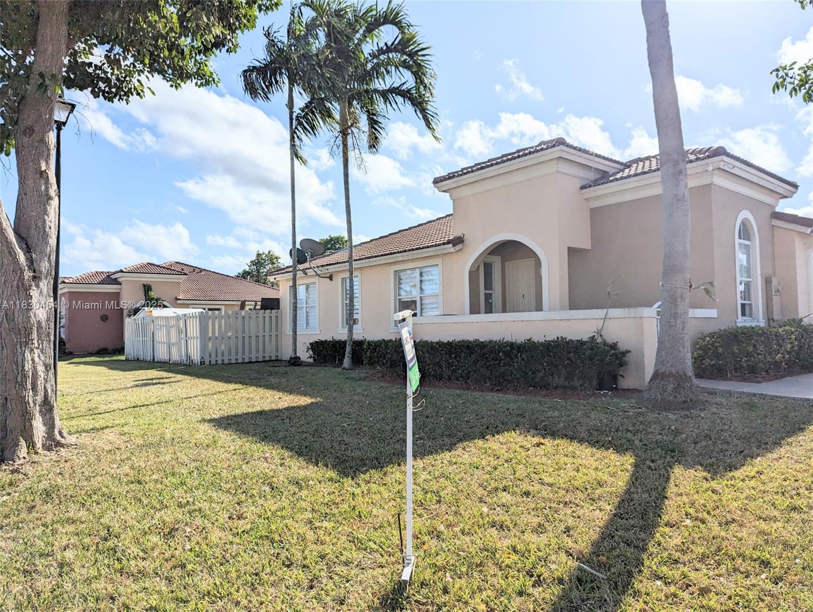 This one-story corner villa features all tile flooring, stainless steel appliances, and a fenced-in patio—perfect for relaxing or entertaining. Conveniently located near schools, shopping centers, and all major highways, shopping, and all the major highways.