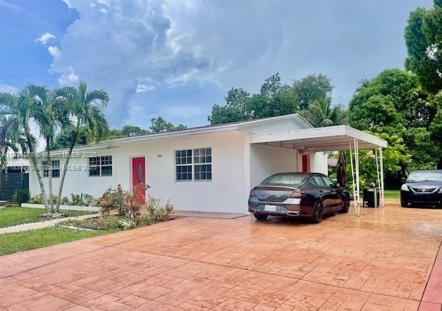 Spectacular house with 3 bedrooms, 2 bathrooms, located off Ives Dairy road. Tile flooring throughout the entire house, spacious bedrooms, kitchen with view of oversized backyard. Laundry room provides additional storage space if needed. Open floor plan, plenty of windows with natural light entering the house. Completely gated for privacy, carport allowing for additional parking spaces. Huge backyard (9230 SQFT) consisting of an abundance of tropical fruit trees; with plenty of space to add swimming pool. House is located in the perfect location; steps away from Publix, Walgreens, and just a few miles to Jackson North Medical Center, I-95, Aventura Mall, Skylake Mall, Greynolds Park, and Hard Rock Stadium. Cannot ask for a better location for the entire family to enjoy and appreciate.