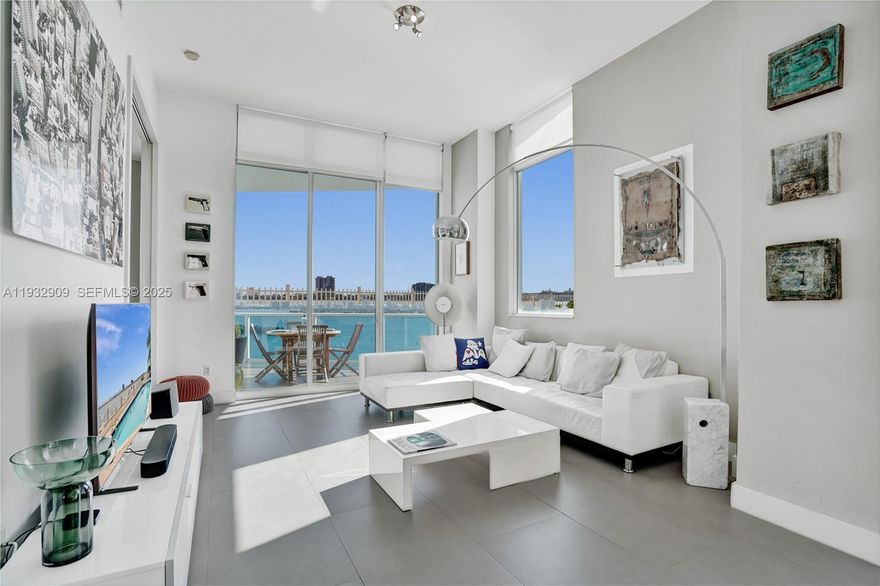 Luxury waterfront PENTHOUSE Residence with spectacular direct and unobstructed views of the Ocean, Biscayne Bay, Miami Beach and beyond. Tastefully renovated and decorated with new bathrooms and high- end finishes. This CORNER unit offers 2 Beds / 2 Baths + DEN, 1 cover- assigned parking space one storage, 12’ ceilings and extra-large terrace perfect for entertaining, plus 2 additional balconies. Floor to ceiling impact resistant windows and sliding doors. This Kobi Karp Designed BOUTIQUE Building offers a bayside pool, Sunset Terrace, gym overlooking the bay and 24-hr Concierge/ Security. Excellent location with easy access to Miami Beach, Downtown, Brickell, Wynwood, Design District and Miami International Airport. Truly a fantastic place to call home.