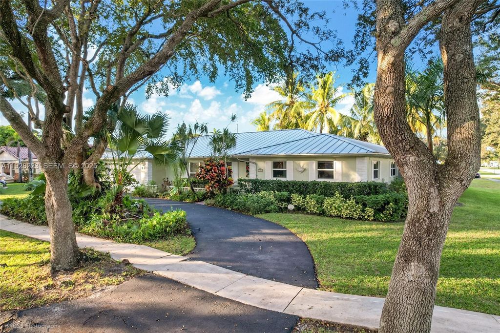 Photo of 7201 NW 7th Ct, Plantation, FL 33317 (MLS # A11928223)